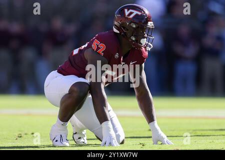 Virginia Tech defensive lineman Antwaun Powell-Ryland runs a drill at ...