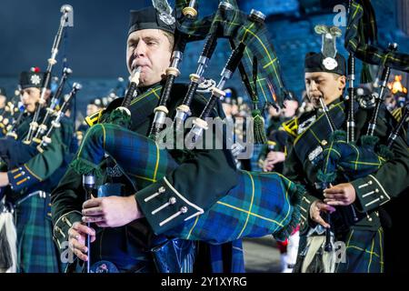 Scottish soldiers marching playing bagpipes, Edinburgh Military Tattoo performance, Scotland, UK Stock Photo