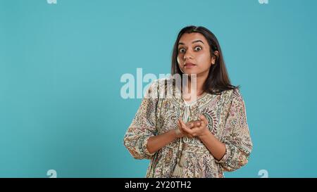 Portrait of envious indian woman mockingly clapping hands, showing ...