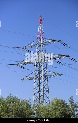 High-voltage pylon on the motorway, baluert Himmel, Baden-Wuerttemberg, Germany, Europe Stock Photo