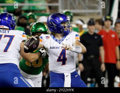 Boise State Quarterback Maddux Madsen (4) Embraces Offensive Lineman 