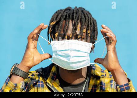 young black man wearing a protective mask Stock Photo