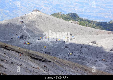 View on the slopes approaching the peak of Mount Merapi which is rocky ...