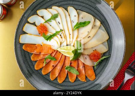 slices of fish on a plate Stock Photo