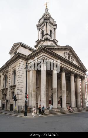 St George's Hanover Square. Anglican church with bell tower clock and lantern on corner of St George Street and Maddox Street, Mayfair, London, UK Stock Photo