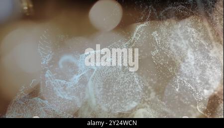 Abstract particles and light streaks image over blurred background Stock Photo