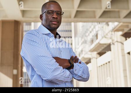 Confident Young Professional in Urban Setting Stock Photo