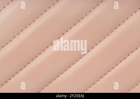 Close-Up of Beige Quilted Leather Texture Stock Photo