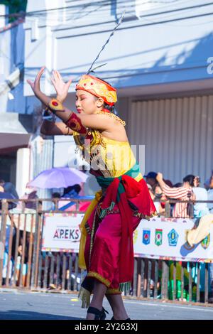 Dayak Ngaju dance from Central Kalimantan on the 3rd BEN Carnival. This dance is about expressing gratitude for an abundant harvest. Stock Photo