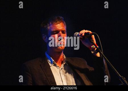 THE WALKMEN,, CONCERT, GREEN MAN FESTIVAL 2012:  Hamilton Leithauser from The Walkmen playing live on the Mountain Stage at the Green Man Festival 2012 at Glanusk Park, Brecon, Wales, August 2012. Photo: Rob Watkins. INFO: The Walkmen are an American indie rock band known for their atmospheric sound, blending post-punk and alternative rock influences. With emotive vocals, dynamic instrumentation, and introspective lyrics, their music explores themes of love, nostalgia, and personal struggle, creating a timeless, moody feel. Stock Photo