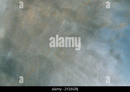 Close-up of scratched and weathered metal surface. Backgrounds and textures. Stock Photo