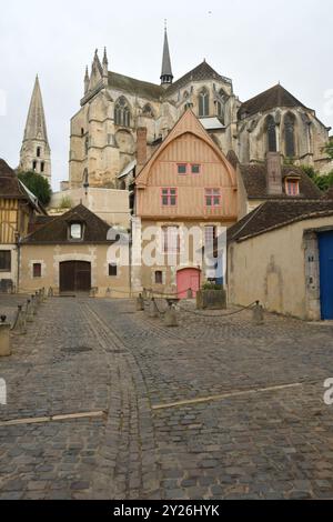 Auxerre is a medieval city on the Yonne River with ancient timber-framed half-timbered houses and the ancient Gothic Saint-Germain Abbey. Stock Photo