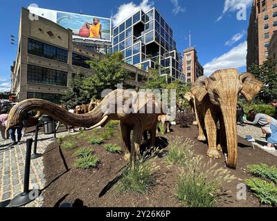 New York, USA. 9/8/24, New York, New York, United States “The Great Elephant Migration,” a touring public-art exhibition of 100 life-sized sculptures of Indian elephants on display along the Meat Packing District until October 20, 2024. Coexistence Collective, a community of 200 indigenous artisans in partnership with NGO Elephant Family USA. Sales of these sculptures benefit conservation NGOs from around the world supporting the coexistence of wildlife and humans; prices range from $8,000 for a baby up to $22,000 for a Bull with tusk. Credit: Jennifer Graylock/Alamy Live News Stock Photo