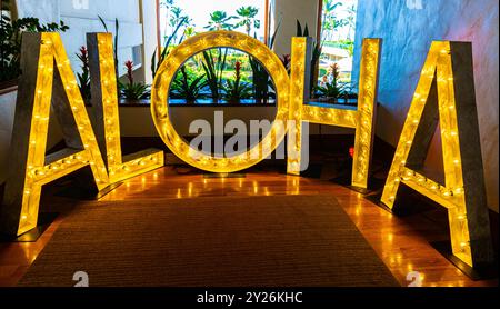 Illuminated Aloha Sign at Resort Hotel on Shipwreck Beach, Poipu, Kauai, Hawaii, USA Stock Photo