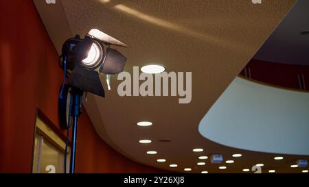 A spotlight in a bity hall. Stock Photo