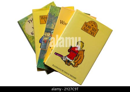 Selection of childrens books with Now we are Six book  by A A Milne on top isolated on white background Stock Photo