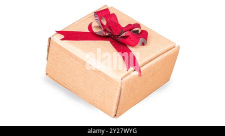 Cardboard gift box with a red bow on white background Stock Photo