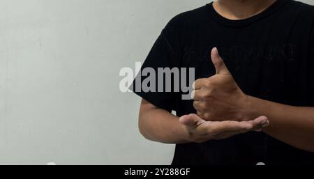 young man learning sign language Stock Photo