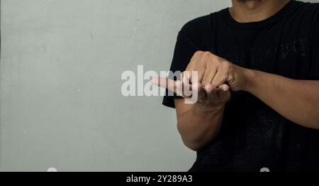 young man learning sign language Stock Photo