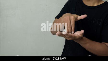 young man learning sign language Stock Photo