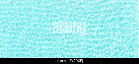 turquoise ocean waves, top view. Blue sea surface with transparent water as background Stock Photo