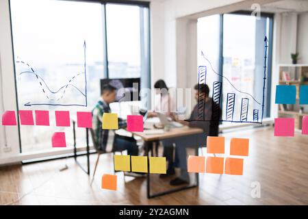 IT experts working on artificial intelligence developments in modern office Stock Photo