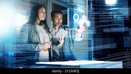 Dark office, man and woman with data overlay, tablet and digital code for system management in crypto trading. Future technology, dashboard and team Stock Photo