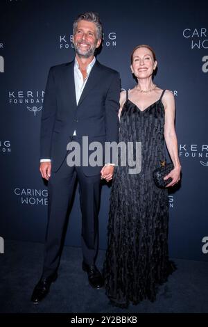 New York, United States. 09th Sep, 2024. NEW YORK, NEW YORK - SEPTEMBER 09: (L-R) Bart Freundlich and Julianne Moore attend the Kering's 3rd Annual Caring for Women Dinner at The Pool on September 09, 2024 in New York City. Credit: Ron Adar/Alamy Live News Stock Photo