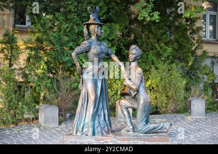 Kyiv, Ukraine - May 19, 2024: Monument Za Dvoma Zaytsyamy (""Chasing Two Hares""): Pronya Prokopivna and Holokhvastov Stock Photo