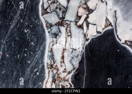 Natural marble slab with white and black veins, offering a refined texture for decor Stock Photo