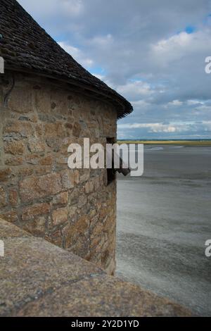 France, the picturesque village of  Mont Saint Michel in Normandie, view from wall over landscape Stock Photo