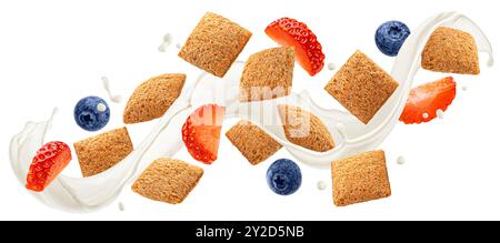 Flying corn pads breakfast with milk splash, blueberry and strawberry isolated on white background Stock Photo