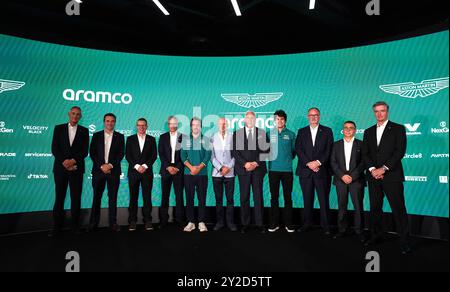 Lawrence Stroll, Executive Chairman, Aston Martin Aramco Formula One Team with Adrian Newey, newly appointed managing technical partner and drivers Fernando Alonso and Lance Stroll following a press conference at the AMF1 Team Technology Campus, Silverstone, Northamptonshire. Picture date: Tuesday September 10, 2024. Stock Photo