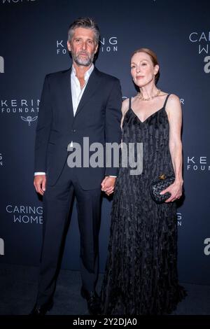 New York, New York, USA. 9th Sep, 2024. (NEW) 2024 Kering's Caring for Women Dinner. September 09, 2024, New York, New York, USA: (L-R) Bart Freundlich and Julianne Moore attend the Kering's 3rd Annual Caring for Women Dinner at The Pool on September 09, 2024 in New York City. (Credit: M10s/TheNews2) (Foto: M10s/Thenews2/Zumapress) (Credit Image: © Ron Adar/TheNEWS2 via ZUMA Press Wire) EDITORIAL USAGE ONLY! Not for Commercial USAGE! Stock Photo