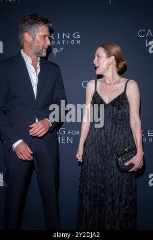 New York, New York, USA. 9th Sep, 2024. (NEW) 2024 Kering's Caring for Women Dinner. September 09, 2024, New York, New York, USA: (L-R) Bart Freundlich and Julianne Moore attend the Kering's 3rd Annual Caring for Women Dinner at The Pool on September 09, 2024 in New York City. (Credit: M10s/TheNews2) (Foto: M10s/Thenews2/Zumapress) (Credit Image: © Ron Adar/TheNEWS2 via ZUMA Press Wire) EDITORIAL USAGE ONLY! Not for Commercial USAGE! Stock Photo