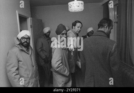 Current 1-3-1973 : A new start in a strange, cold world.They own nothing, except a strong belief that it will succeed for them. They will start a new life in Norway. 33 of the 100 Asians who came to Norway after being thrown out by the dictator Idi Amin in Uganda now live in Bergen. What do we do to help them make a fresh start?  Photo: Svein Kløvig / Aktuell / NTB ***PHOTO NOT IMAGE PROCESSED***   This image text is auto translated Stock Photo