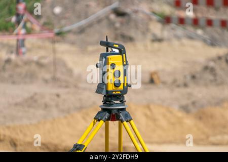 A surveying instrument for measuring distances on a construction site. total station theodolite. Stock Photo