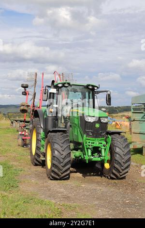 a tractor of the brand 'John Deere 6175M' in Blieskastel on September 10, 2024 Stock Photo