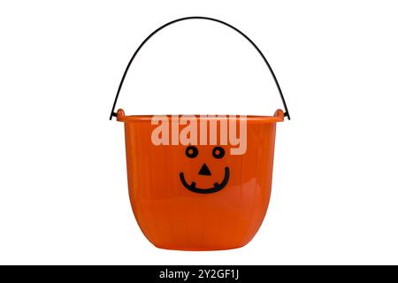 Halloween bucket Jack o Lantern plastic Halloween bucket for collecting sweets, candies and treats for trick and treat isolated on white background Stock Photo