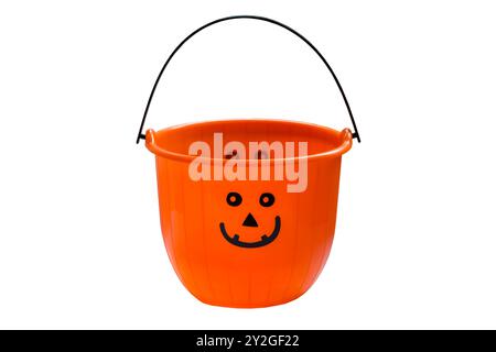 Halloween bucket Jack o Lantern plastic Halloween bucket for collecting sweets, candies and treats for trick and treat isolated on white background Stock Photo
