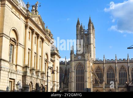 A Photographic Combination Of The Adjacent Historic Buildings The Guildhall And The Gothic Cathedral Bath Abbey In Bath, England Stock Photo