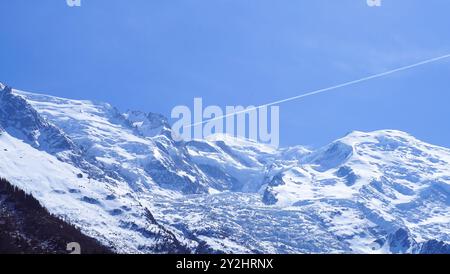 Mont Blanc Summit with a Chemtrail Across the Sky Stock Photo