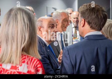 Lyon, France. 10th Sep, 2024. French president Emmanuel Macron speaks with Dassault's Chairman and Chief Executive Officer Eric Trappier, in Lyon on September 10, 2024. Photo by Eliot Blondet/ABACAPRESS.COM Credit: Abaca Press/Alamy Live News Stock Photo