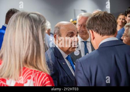 Lyon, France. 10th Sep, 2024. French president Emmanuel Macron speaks with Dassault's Chairman and Chief Executive Officer Eric Trappier, in Lyon on September 10, 2024. Photo by Eliot Blondet/ABACAPRESS.COM Credit: Abaca Press/Alamy Live News Stock Photo