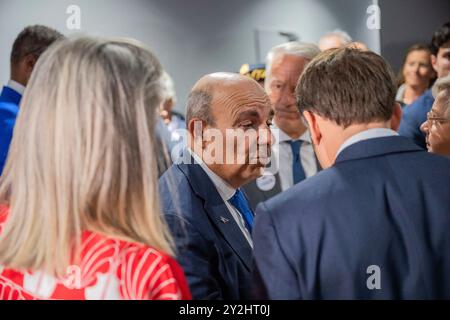 Lyon, France. 10th Sep, 2024. French president Emmanuel Macron speaks with Dassault's Chairman and Chief Executive Officer Eric Trappier, in Lyon on September 10, 2024. Photo by Eliot Blondet/ABACAPRESS.COM Credit: Abaca Press/Alamy Live News Stock Photo