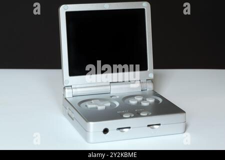 Houston, Texas, USA - September 10, 2024: Anbernic RG35XXSP retro handheld game console Stock Photo