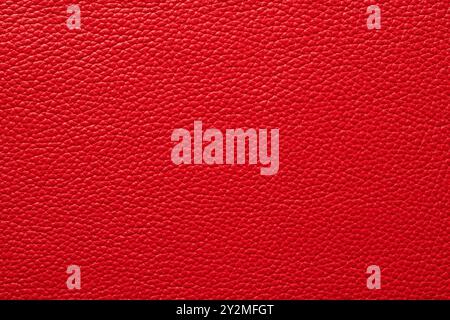 genuine leather dyed red. leather texture background Stock Photo