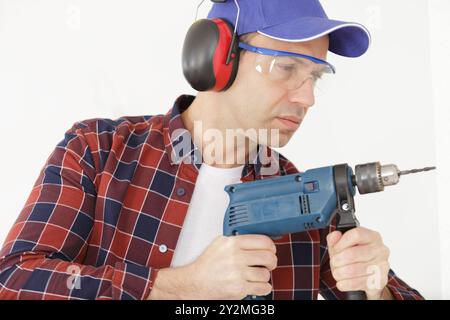 close-up the man holding a screw driver Stock Photo