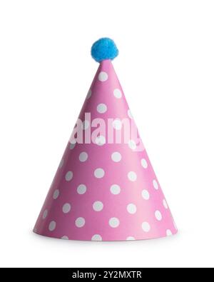 Classic pink party hat with white polka dots and blue pompom standing isolated  on white background Stock Photo