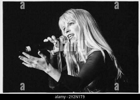 TOYAH, CONCERT, 2002: Punk icon Toyah Wilcox playing live in a steel breastplate at Cardiff International Arena in Cardiff, Wales, UK on 18 April 2002. Photo: Rob Watkins. INFO: Toyah Willcox, known mononymously as Toyah, is a British singer, actress, and presenter. Rising to prominence in the late '70s and '80s, her vibrant stage presence and diverse career span pop music, film, and theatre, establishing her as a multifaceted and iconic entertainer. She appeared on Strictly Come Dancing in 2024. Stock Photo